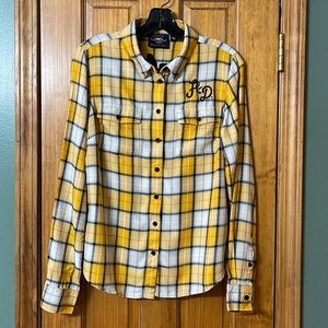 Harley-Davidson woman’s size medium long sleeve shirt. Snap collar. Excellent co